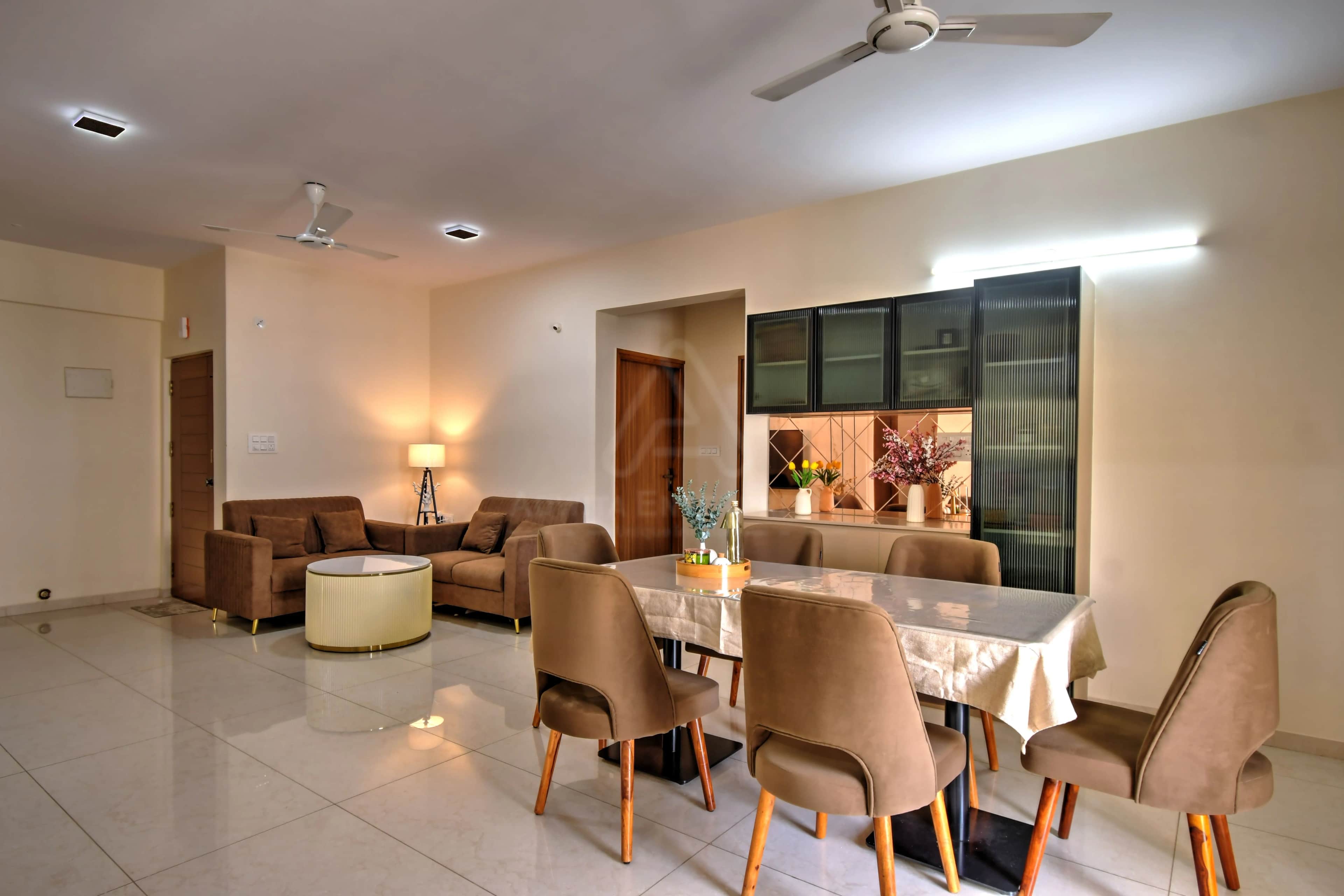 Modern living room featuring two single premium sofas and ambient lighting
