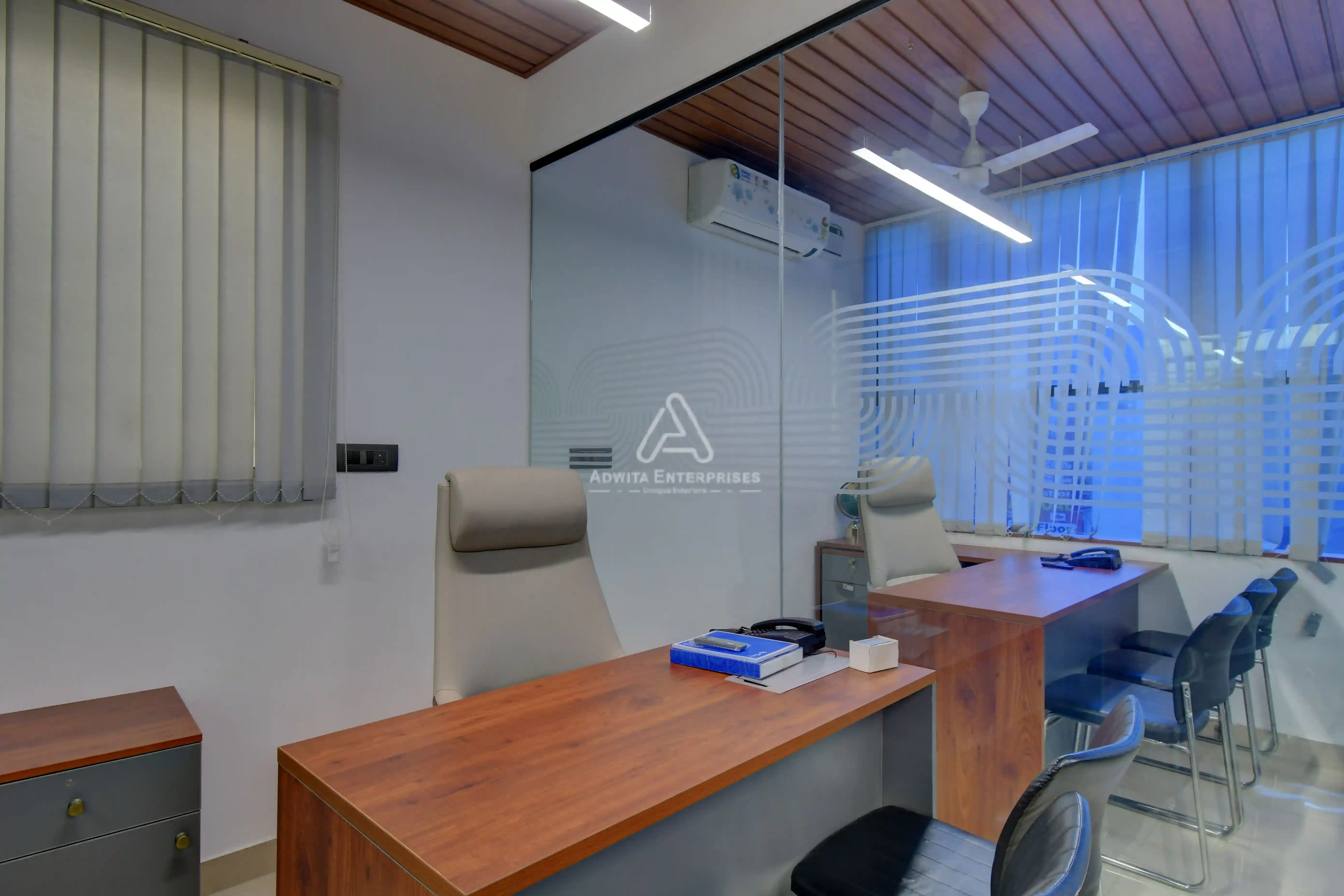 Workstation area with ergonomic desks, chairs, and modern office design